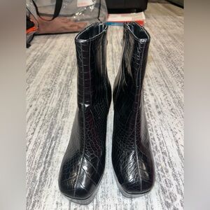 Platform snakeskin booties